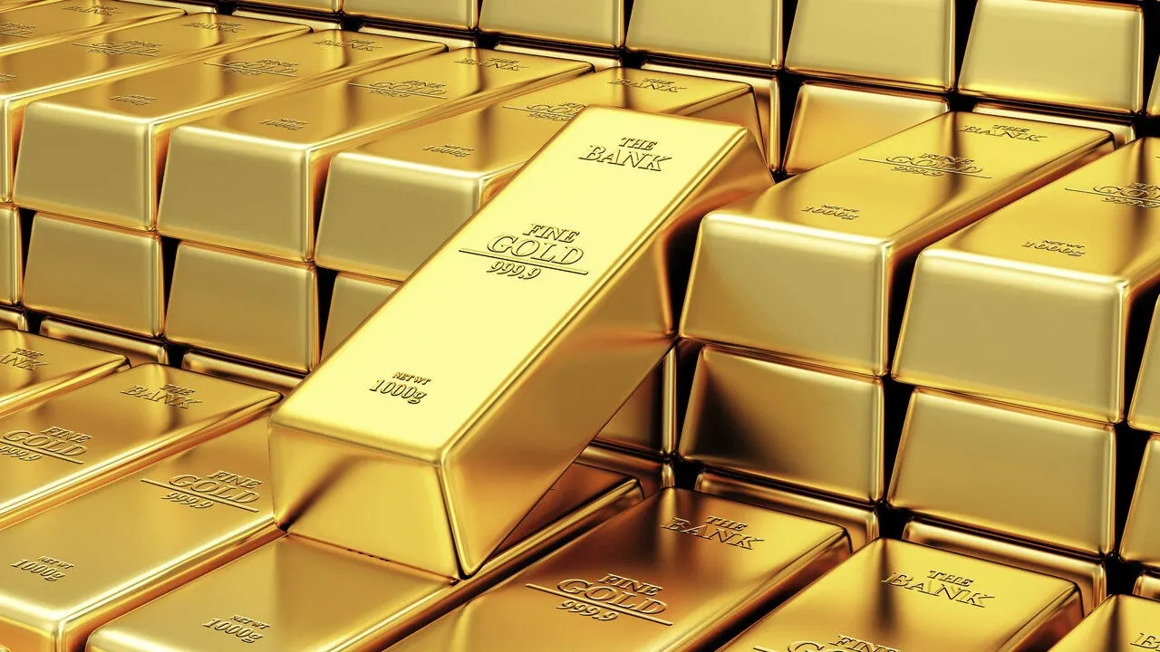 Rows of stacked gold bars stamped Fine Gold 999.9
